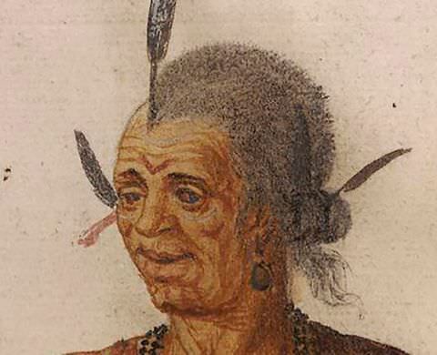 Drawing. A colour drawing of an older person’s head. They have tanned, wrinkled skin, and wear a series of feathers arranged onto their head and hair. Their head is slightly turned to the left of the image, revealing a long, dangling earring. A beaded necklace and brown top are just visible at their neckline. 